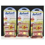 Three packs of 4 Refesh clip on car air fresheners