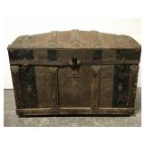 Antique hump back travel trunk
