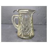 Vintage creamer with metal top