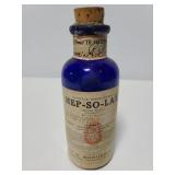 Antique blue glass Hep-So-lax with contents