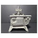 Antique cast metal mini doll house stove