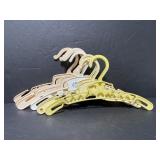 Lot of 8 vintage plastic baby clothes hangers