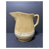 Vintage stamped glazed pottery pitcher