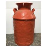 Old orange metal Fairlawn Dairies milk jug