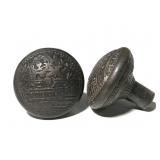 Pair of antique cast metal door knobs