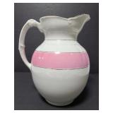 Unmarked ceramic pitcher