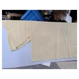 Oblong and round yellow table cloths