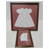 Framed antique baby dress and bonnet
