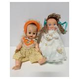 Two small vintage dolls