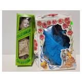 Two vintage dolls in boxes