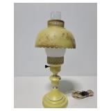 Small yellow metal hurricane lamp