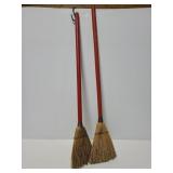 Pair of small brooms