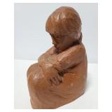 Resin statue of a woman