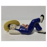 Figurine of person relaxing