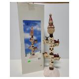 Paul F. Bolinger resing North Pole statue