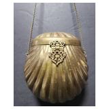 Brass shell hand bag