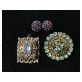 Jeweled brooch, earrings and pendant