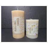 Two Opal house pillar candles
