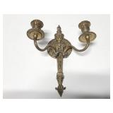 Marked brass wall candlestick