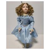 Porcelain doll with stand