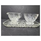 Cut glass sugar and creamer on tray