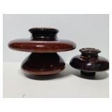 Two large ceramic railroad insulators