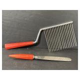 Vintage red marbled Bakelite cake slicer set