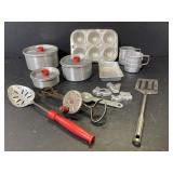 Vintage tiny aluminum child