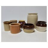 Collection of small pottery crocks and jars