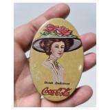 Sewing kit in vintage Coca-Cola tin