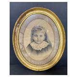 Antique gold framed girls portrait