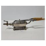 Antique gas curling iron