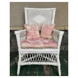 Vintage white wicker chair w/ pink cushions