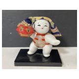 Small wood painted Asian figure