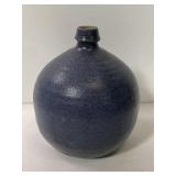 Round stone pottery vase