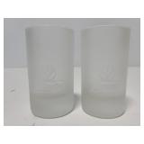 Two frosted jägermeister shot glasses