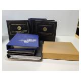 Hundreds of 1st day covers w/ albums & extras