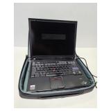 IBM Think pad laptop with cord and case