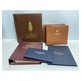 Lot of 7 US stamp collection books