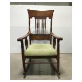 Antique oak wood rocking chair w/ green seat