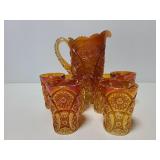 Orange carnival glass beverage set