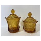 Pair of vintage amber glass covered coin dishes