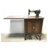 Vintage White Co. sewing machine in cabinet