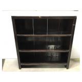 Old dark wood bookcase shelf