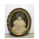 Antique oval gilt wood framed baby portrait