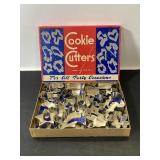 Vintage box of metal cookie cutters