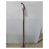 Vintage red metal grabber tool