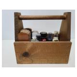 Shoe shine items in wood carrier