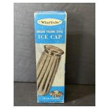 1920s ice cap with box