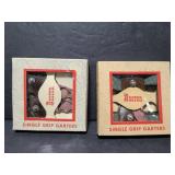 Two Boston single grip garters, in boxes